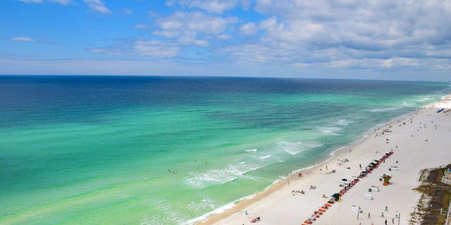 This is an aerial view, taken by a drone, of a white sand beach in Destin, Florida. During a recent segment of "American Dream Home," a family revealed how they began a new life for themselves in Destin. 