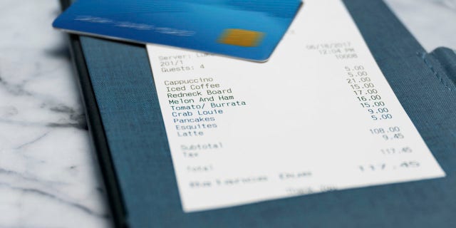 Some restaurants in England are telling customers that they have to pay before they eat.