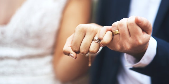 "Yes, she went to the weddings of his friends," wrote one commenter about the couple's dilemma, "but she shouldn’t hold that against him, suggesting that he now was to repay the favor."