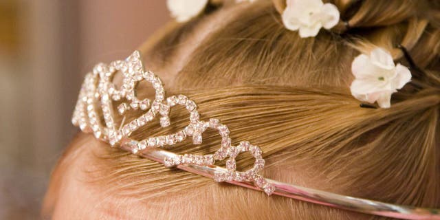 A bride doesn't like the idea of her flower girl wearing a tiara to her wedding, according to a redacted social media post she allegedly shared. (iStock)
