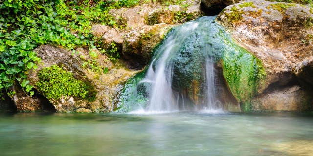 Hot Springs National Park is in central Garland County, Arkansas. It is home to 47 geothermal springs and eight bathhouses.