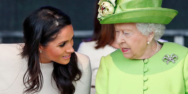 Meghan, Duchess of Sussex, and Queen Elizabeth II attend a ceremony to open the new Mersey Gateway Bridge June 14, 2018, in Widnes, England. 