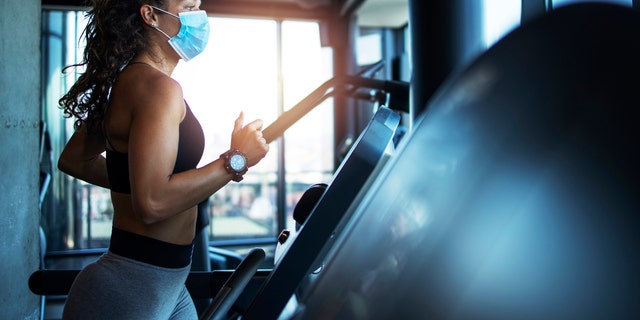 Early research suggests that face masks used to prevent the spread of the novel coronavirus are safe to use even during intense exercise, and could help to curb the spread of COVID-19 at indoor gyms. 
