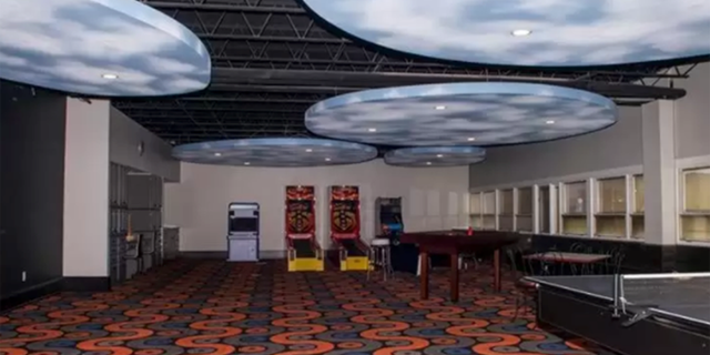 The home also features arcade games and a basketball court.