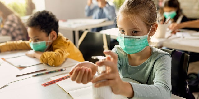 Elementary students wearing masks in the classroom