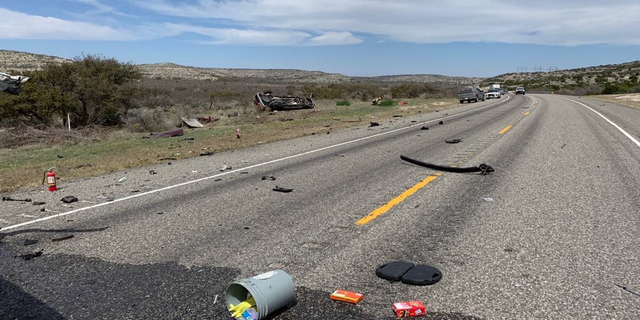 Debris is seen strewn along U.S. 277 following the crash Monday afternoon. (Texas Department of Public Safety)