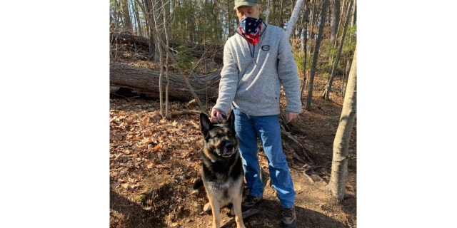 Thomas Walsh and his 5-year-old German Shepherd, Diesel, helped rescue a man who fell through the ice Wednesday. (Stoneham Fire Department)