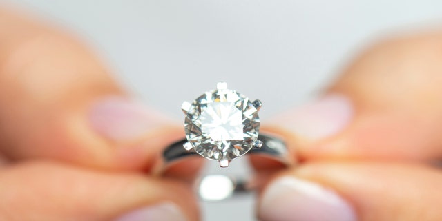 The couple got the bride's ring back the next day with the help of a local scuba diver.