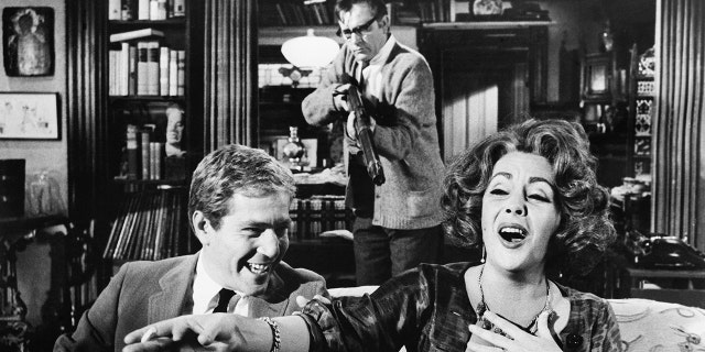 Left to right: George Segal, Richard Burton and Elizabeth Taylor in 'Who's Afraid of Virginia Woolf?' (1966). (Photo by George Rinhart/Corbis via Getty Images)