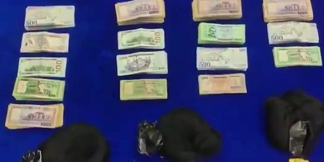 Wig smugglers caught with gold cash