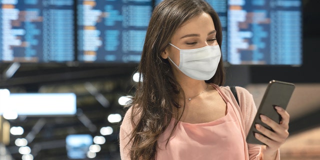 "So if you choose to travel, TSA reminds you to please continue to wear your mask," TSA spokesperson Lisa Farbstein tweeted on Wednesday.