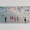 Beachgoers take advantage of the weather as they spend time on Clearwater Beach, Florida, March 2, 2021, a popular spring break destination, west of Tampa. Colleges around the U.S. are scaling back spring break or canceling it to discourage beachfront partying that could raise infection rates back on campus. (AP Photo/Chris O'Meara)