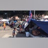 A Joe Biden campaign flag is seen at a migrants camp, where asylum seekers wait for U.S. authorities to allow them to start their migration process outside the El Chaparral crossing port in Tijuana, Baja California state, Mexico, on March 21, 2021. President Biden's pledge of a more humane approach has sparked a new rush to the border, threatening to become a huge political liability. Republicans are accusing him of opening the country's doors to illegal border crossers and sparking a "crisis" on the U.S.-Mexico frontier, while migrants out of Migrant Protection Protocols (MPP) program are stranded along the U.S.-Mexico border without knowing when or how they will be able to start their migratory process with U.S. authorities.