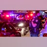 Miami Beach police disperse a crowd that formed near Seventh Street and Alton Road, after crowds were sent away from Ocean Drive in Miami Beach, Florida, on Sunday. (AP/Miami Herald)