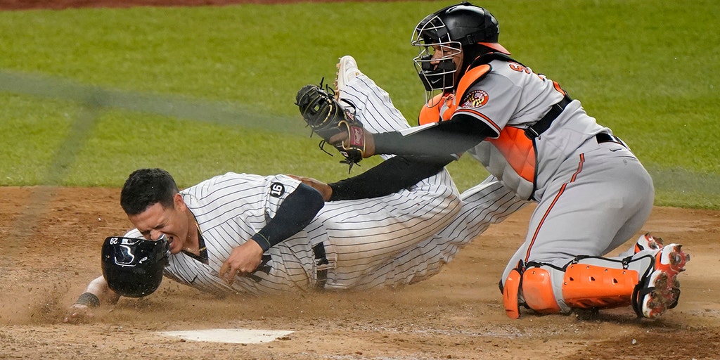 Santander hoses Urshela for last out, O's beat Yanks in
11