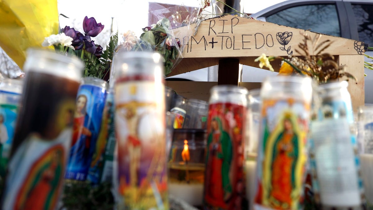 A make shift memorial was made by community members, Tuesday, April 6, 2021, in the memory 13-year-old Adam Toledo, who was shot by a Chicago Police officer at about 2 a.m. on March 29 in an alley west of the 2300 block of South Sawyer Avenue near Farragut Career Academy High School. (AP Photo/Shafkat Anowar)