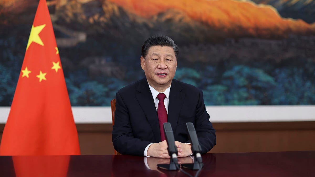 In this photo released by Xinhua News Agency, Chinese President Xi Jinping delivers a keynote speech via video for the opening ceremony of the Boao Forum for Asia (BFA) Annual Conference, in Beijing Tuesday, April 20, 2021.