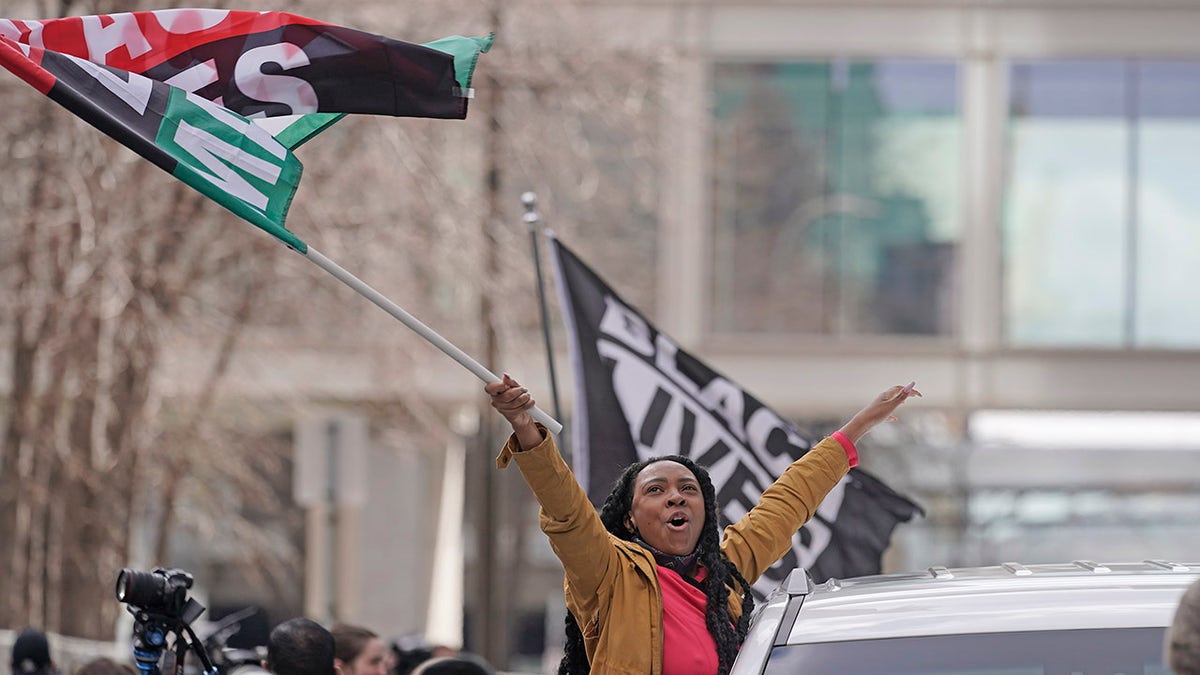 People cheer after a guilty verdict was announced at the trial of former Minneapolis police Officer Derek Chauvin for the 2020 death of George Floyd, Tuesday, April 20, 2021, in Minneapolis, Minn. (AP Photo/Morry Gash)