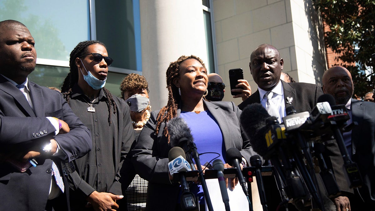 Attorney Chantel Cherry-Lassiter speaks outside the Pasquotank County Public Safety building in Elizabeth City, N.C. Monday April 26, 2021 after viewing 20 seconds of police body camera video. (Travis Long/The News & Observer via AP)