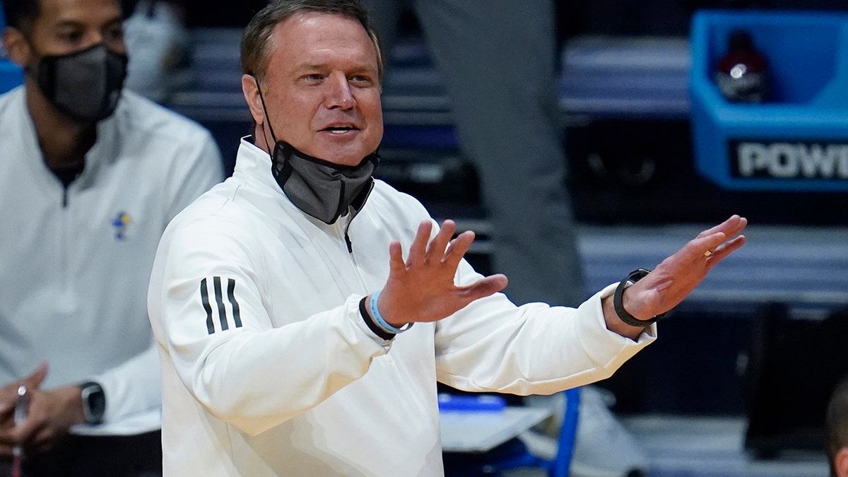 Kansas head coach Bill Self signals against USC during the first half of a men's college basketball game in the second round of the NCAA tournament at Hinkle Fieldhouse in Indianapolis, Monday, March 22, 2021.