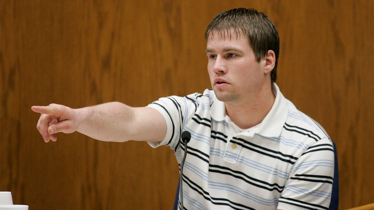 Bobby Dassey, Steven Avery's nephew and the brother of Brendan Dassey, a 17 year old also charged in Tereasa Halbach's death, points out Steven Avery in the courtroom to begin his testimony at the Calumet County Courthouse during third day of Steve Avery's trial in his murder case Wednesday, Feb. 14, 2007, in Chilton, Wis. (AP Photo/Sheboygan Press, Bruce Halmo, Pool)