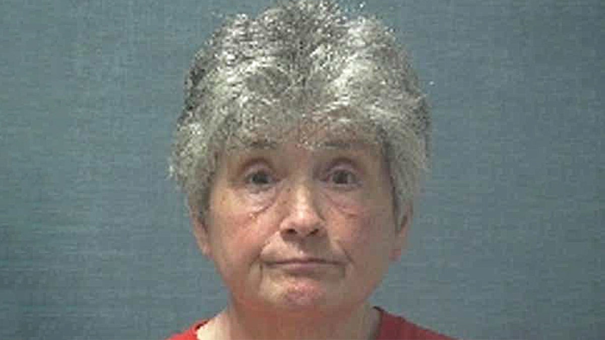Janet Caplinger allegedly burned down the home she lost to foreclosure.