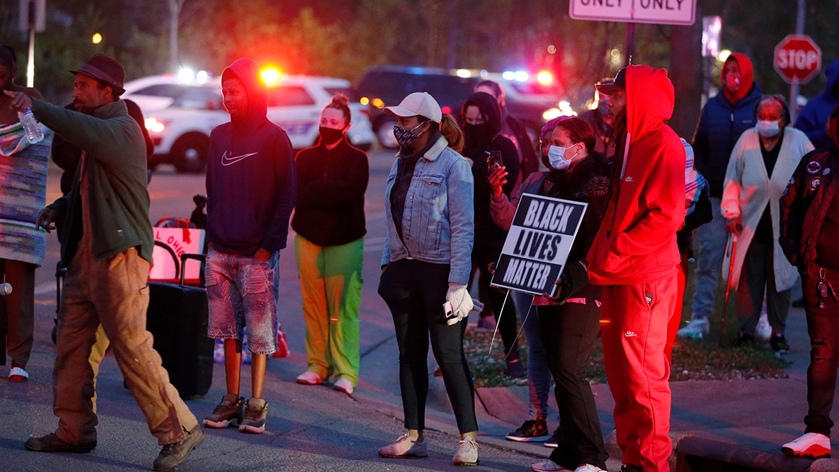 A crowd gathers to protest in the neighborhood where a police officer fatally shot a teenage girl Tuesday in Columbus, Ohio. (AP)