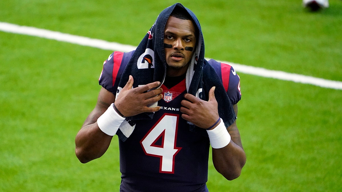 FILE - In this Jan. 3, 2021, file photo, Houston Texans quarterback Deshaun Watson walks off the field before a game against the Tennessee Titans in Houston.