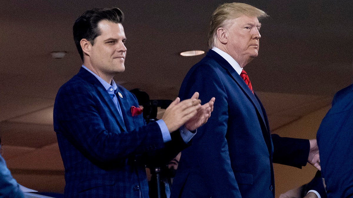 Donald Trump and Matt Gaetz at a baseball game