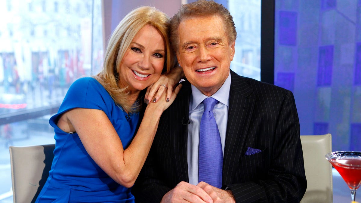 Kathie Lee Gifford poses for a photo with Regis Philbin
