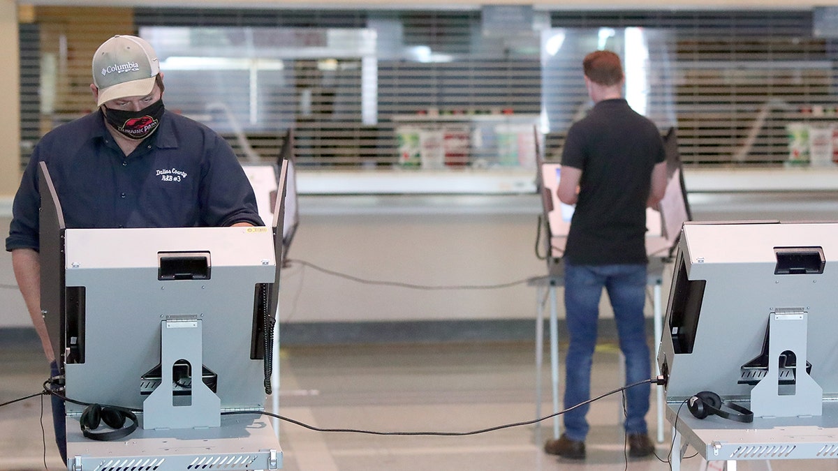 Voters cast their ballots at American Airlines Center Nov. 3, 2020 in Dallas. (Photo by Tom Pennington/Getty Images)