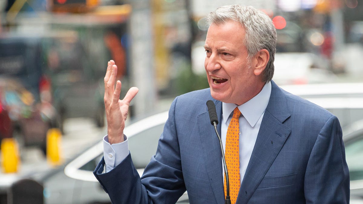Mayor of New York City Bill de Blasio speaks during the opening of a vaccination center for Broadway workers in Times Square on April 12, 2021, in New York City. 