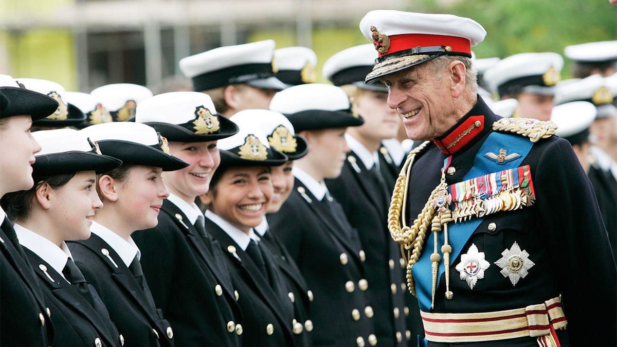 Prince Philip, Duke of Edinburgh meets students from Pangbourne College outside the Falkland Islands Memorial Chapel where he attended a service to mark the 25th anniversary of Liberation Day, June 14, 2007, in Pangbourne, England.