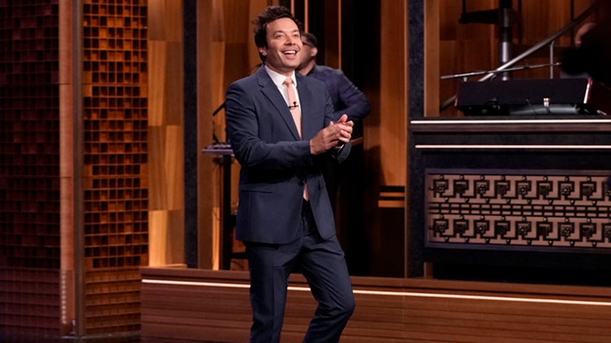 "The Tonight Show" host Jimmy Fallon opens the show on March 26, 2021.