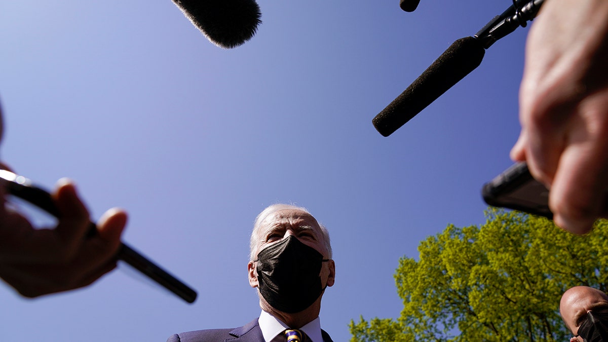 President Biden speaks to members of the media after arriving on the Ellipse on the National Mall after spending the weekend at Camp David, Monday, April 5, 2021, in Washington. (AP Photo/Evan Vucci)