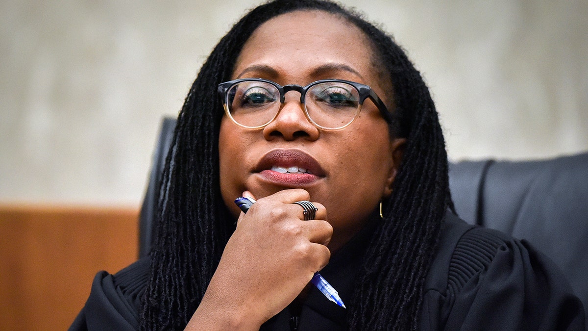 Judge Ketanji Brown Jackson listens to arguments as local high school students observe a reenactment of a landmark Supreme Court case at U.S. Court of Appeals in Washington.