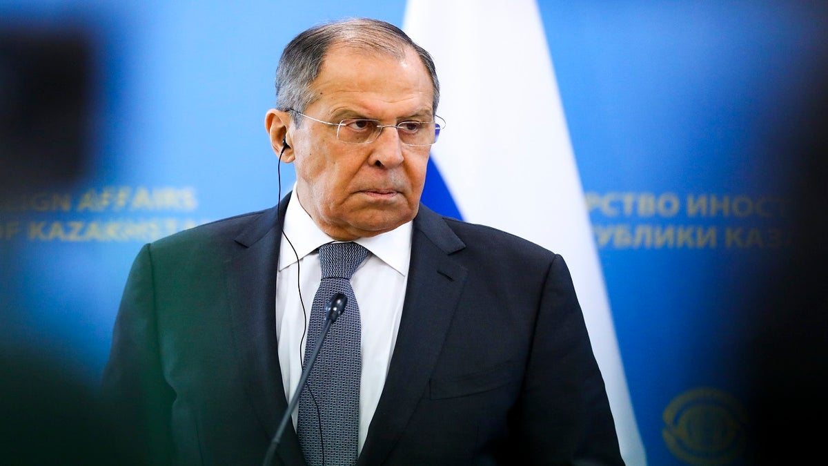Russian Foreign Minister Sergey Lavrov listens to a journalist's question during a press conference Thursday. (AP/Russian Foreign Ministry)