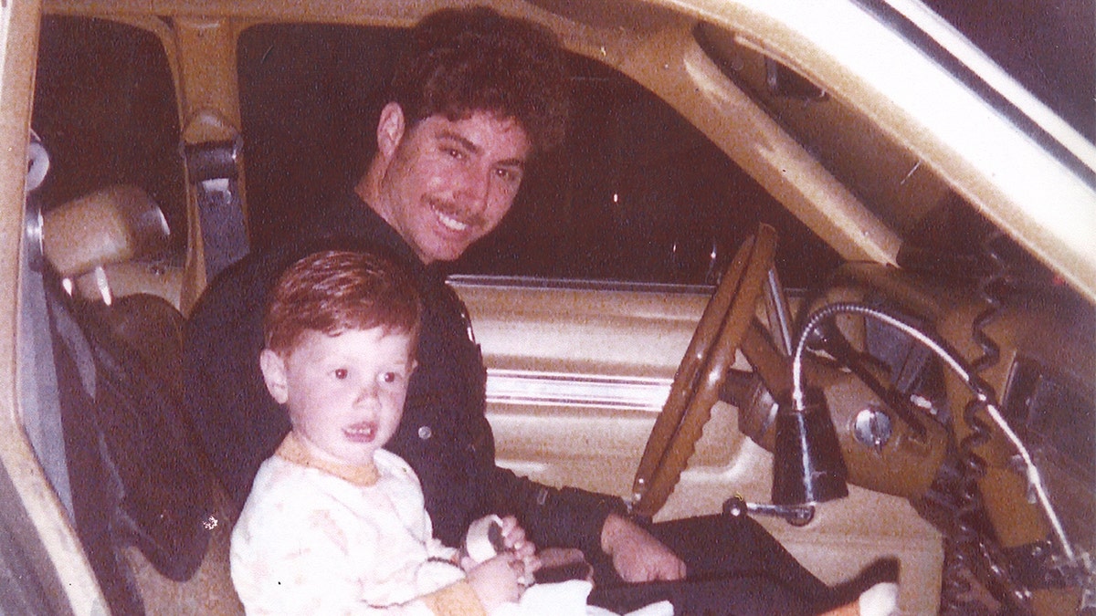 Officer Michael Pavelka and young Matthew Pavelka.