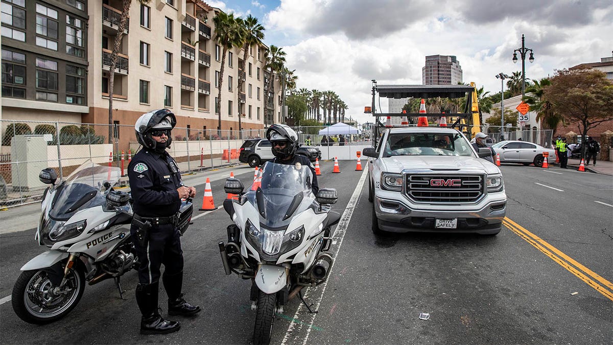 Police officers stand outside Union Station for the Academy Awards on Sunday, April 25, 2021 in Los Angeles, CA. (Brian van der Brug / Los Angeles Times via Getty Images)