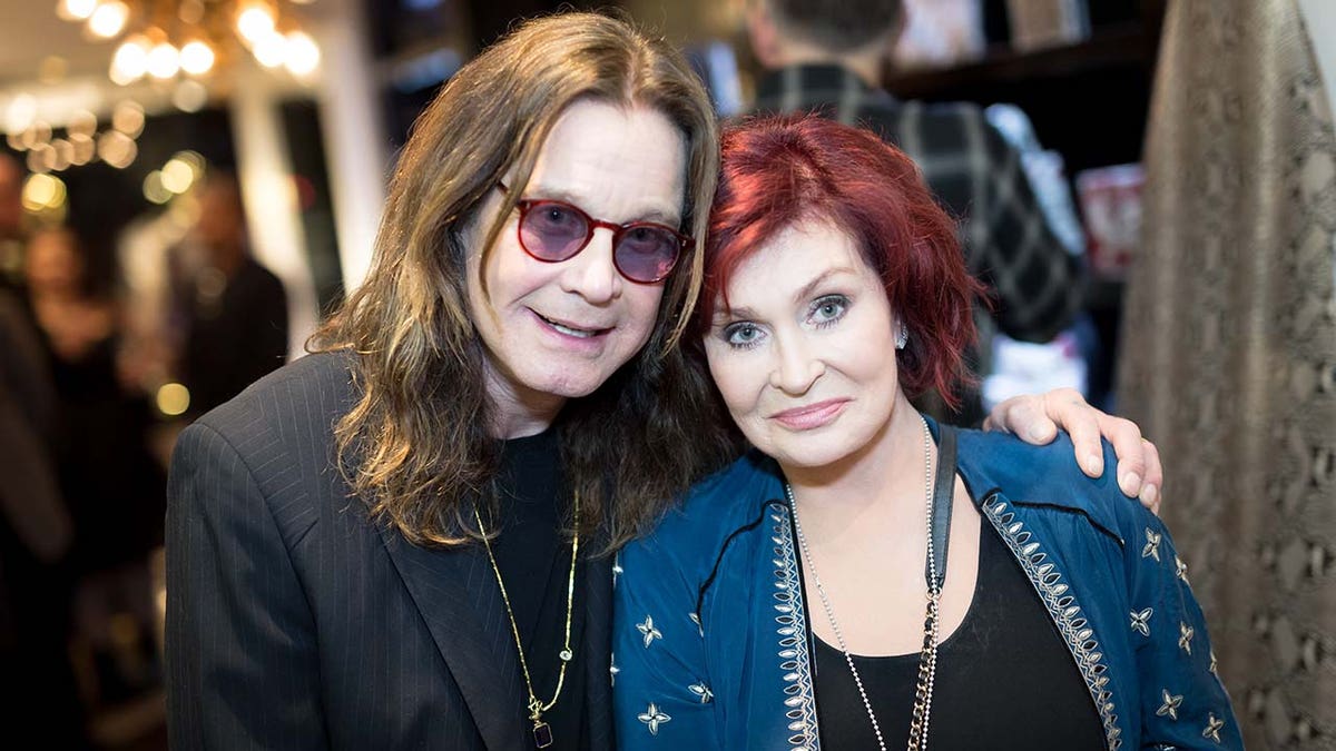 Ozzy and Sharon Osbourne smile