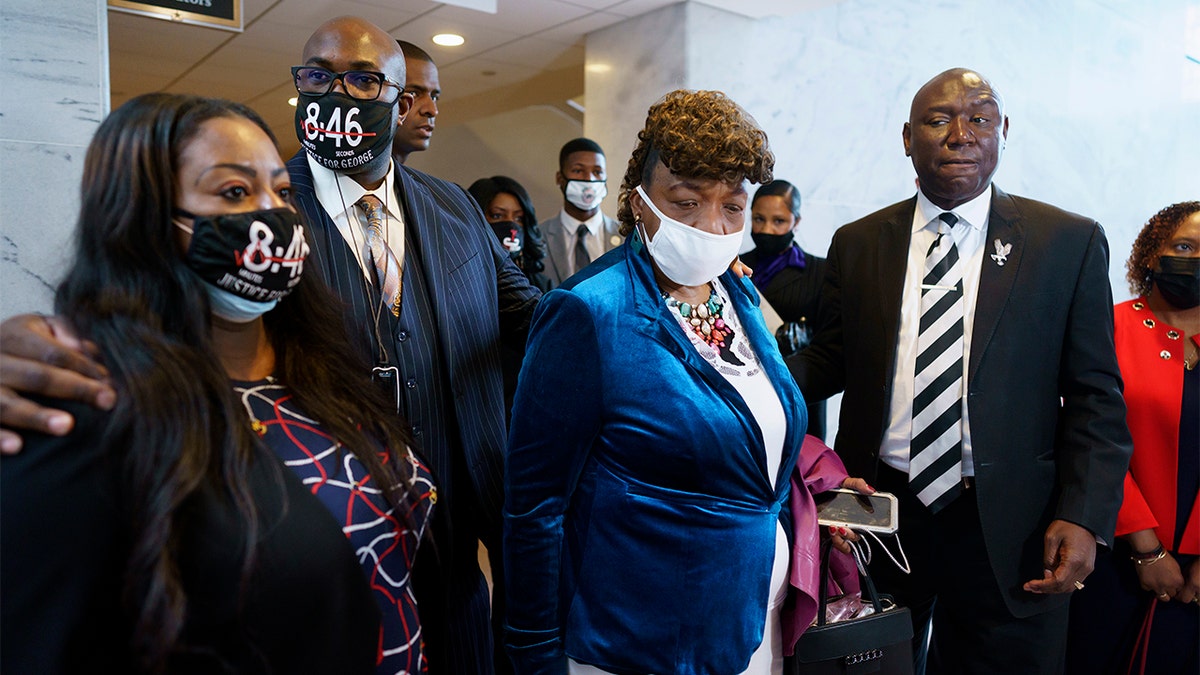 From left, Keeta Floyd, her husband Philonise Floyd, brother of George Floyd who was killed by Minneapolis police, Gwen Carr, mother of Eric Garner who was killed by a New York Police Department officer using a prohibited chokehold during his arrest, and civil rights attorney Ben Crump, who represented the family George Floyd, talk to reporters following a meeting with Sen. Tim Scott, R-S.C., who is working on a police reform bill in the Senate, at the Capitol in Washington, Thursday, April 29, 2021. 