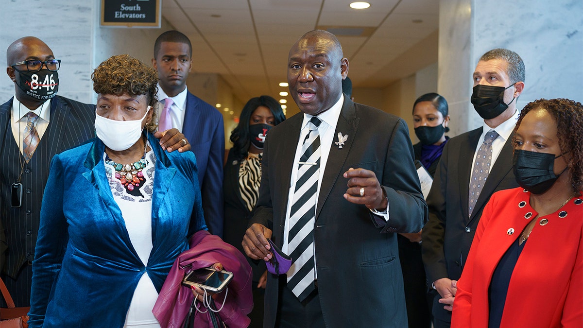 Civil rights attorney Ben Crump, who represented the George Floyd family, is joined by family members of victims of racial injustice following a meeting with Sen. Tim Scott, R-S.C., who is working on a police reform bill in the Senate, at the Capitol in Washington, Thursday, April 29, 2021. At left are Philonise Floyd, brother of George Floyd, and Gwen Carr, mother of Eric Garner who was killed by a New York Police Department officer using a prohibited chokehold during his arrest. 