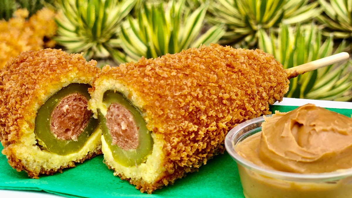The Pickle Corn Dog, which can be found at Disneyland’s Blue Ribbon Corn Dogs Cart in Downtown Disney, is described as a "panko-crusted dill pickle?corn dog served with a side of peanut butter."