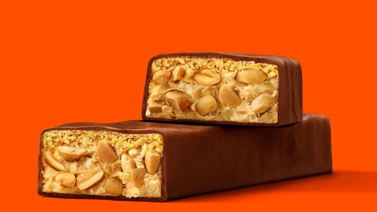 "It’s the peanut butter and chocolate combo you love, now with peanuts and peanut butter crème to give the bar that crunchy and creamy taste fans are sure to love," the Hershey spokesperson said of the new treat.