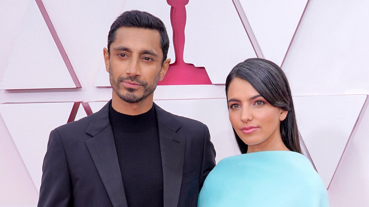 Actor Riz Ahmed and author Fatima Farheen Mirza married at some point over the last year and made their red carpet debut at the Academy Awards. (Photo by Chris Pizzello-Pool/Getty Images)