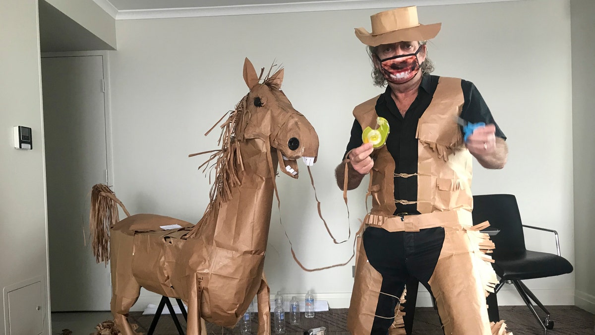 After creating his costume, Marriott went on to make himself a paper horse, which he named Russell. (David Marriott via AP)