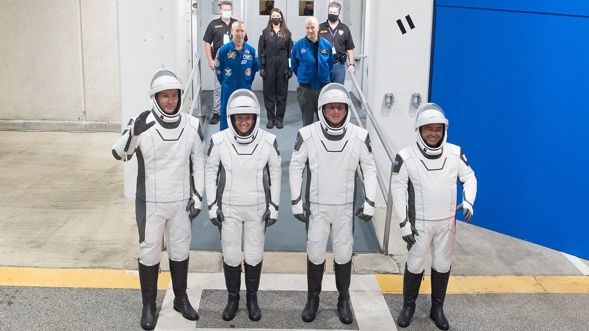 From left to right, ESA (European Space Agency) astronaut Thomas Pesquet, NASA astronauts Megan McArthur and Shane Kimbrough, and Japan Aerospace Exploration Agency (JAXA) astronaut Akihiko Hoshide, wearing SpaceX spacesuits, are seen as they prepare to depart the Neil A. Armstrong Operations and Checkout Building for Launch Complex 39A during a dress rehearsal prior to the Crew-2 mission launch, Sunday, April 18, 2021, at NASA’s Kennedy Space Center in Florida. Photo Credit: (NASA/Aubrey Gemignani)