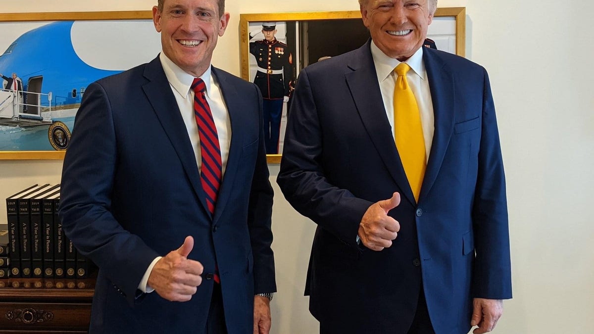 Republican Rep. Ted Budd of North Carolina meets with former President Donald Trump after holding a fundraiser for his burgeoning 2022 Senate campaign at Trump's Mar-a-Lago club in Palm Beach, Florida on Friday, April 23, 2021.
