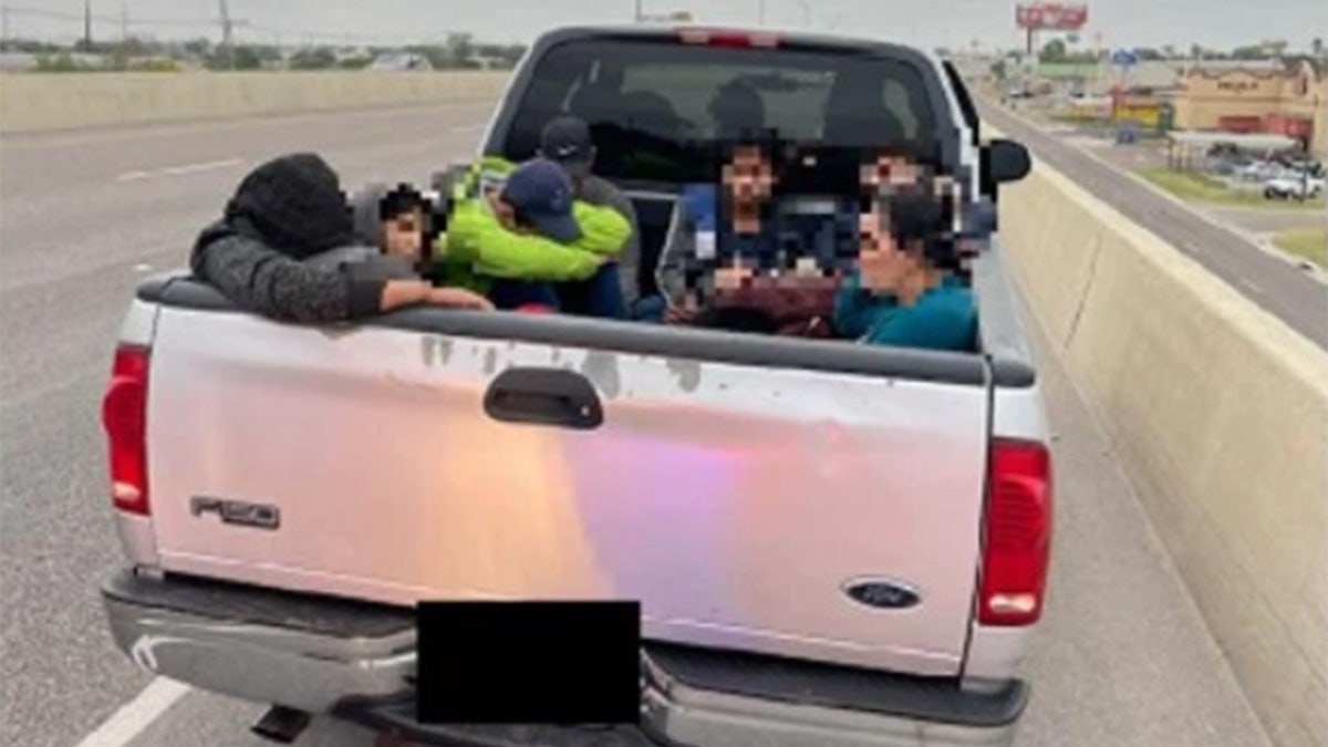 U.S. Customs and Border Protection agents took migrants found in a pickup truck into custody this week. 