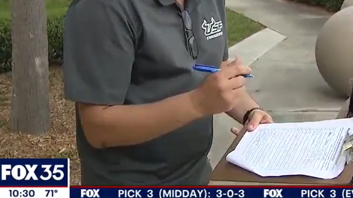 Man signs petition to make masks optional in schools (Credit: Fox 35 Orlando)